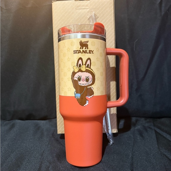 New Stanley 40oz Orange and Cream Travel Mug with Adorable Monster Character - Picture 1 of 7
